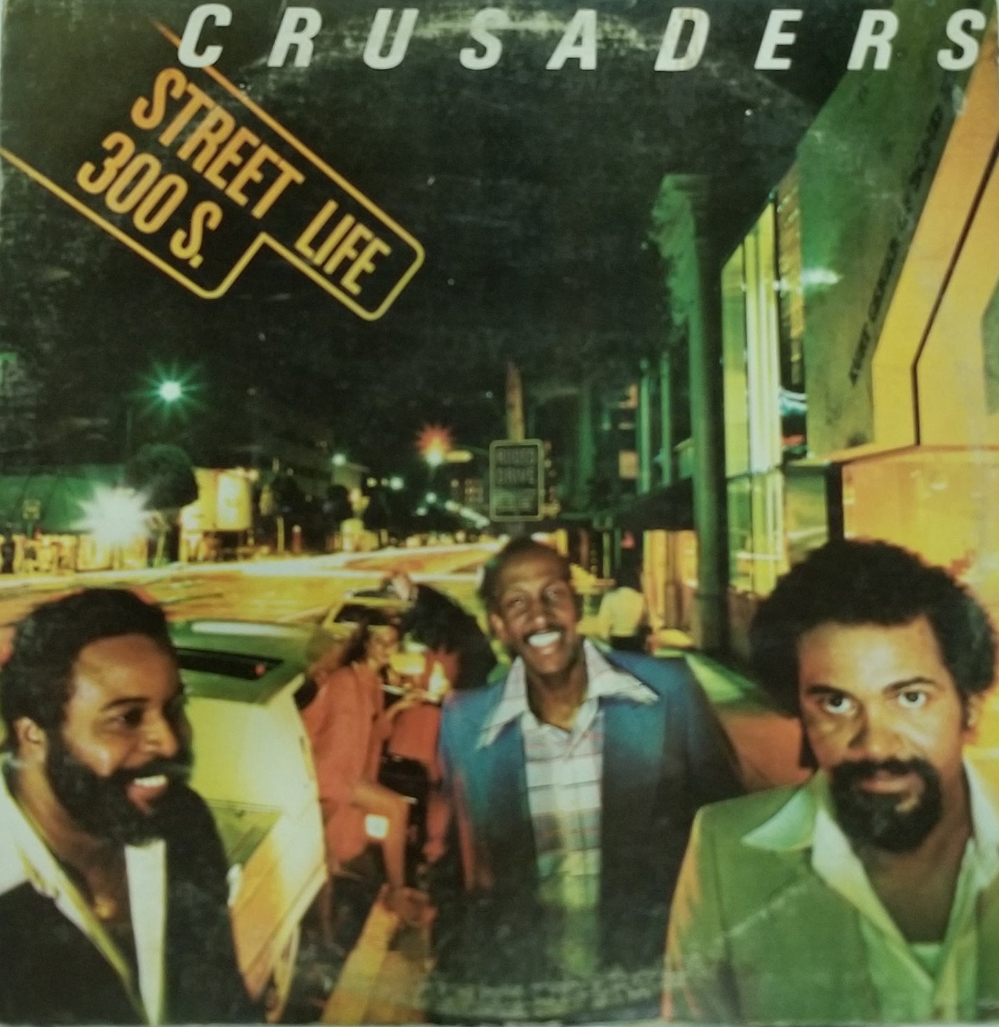 Album cover featuring three men on a city street at night with 'Crusaders Street Life 300 S' text.