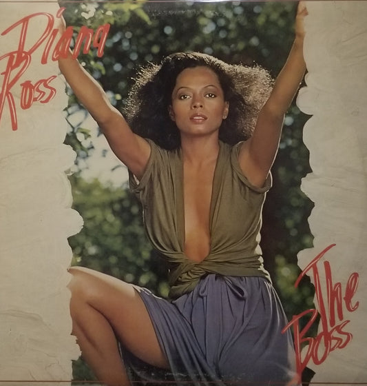 Album cover featuring a woman with her arms raised, with text 'Diana Ross' and 'The Bell's' on a decorative background.