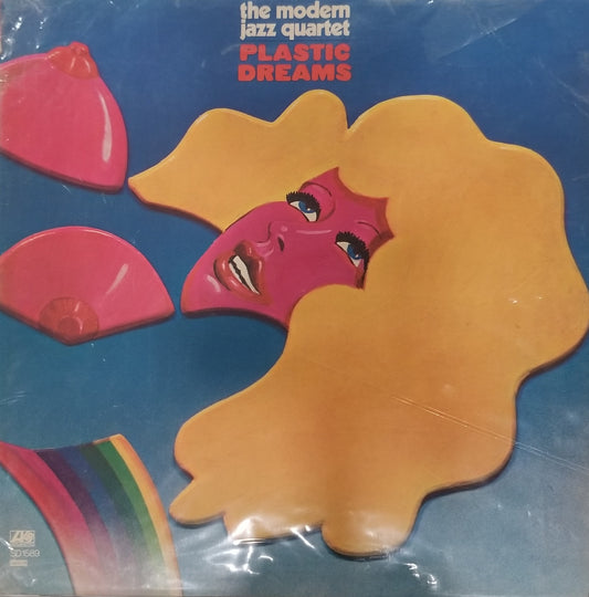 Album cover of 'Plastic Dreams' by The Modern Jazz Quartet with colorful abstract design.
