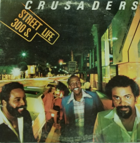Album cover featuring three men on a city street at night with 'Crusaders Street Life 300 S' text.