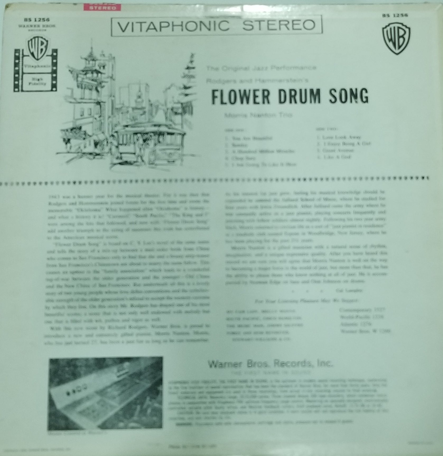 Vintage record cover for 'Flower Drum Song' with text and graphics on a white background