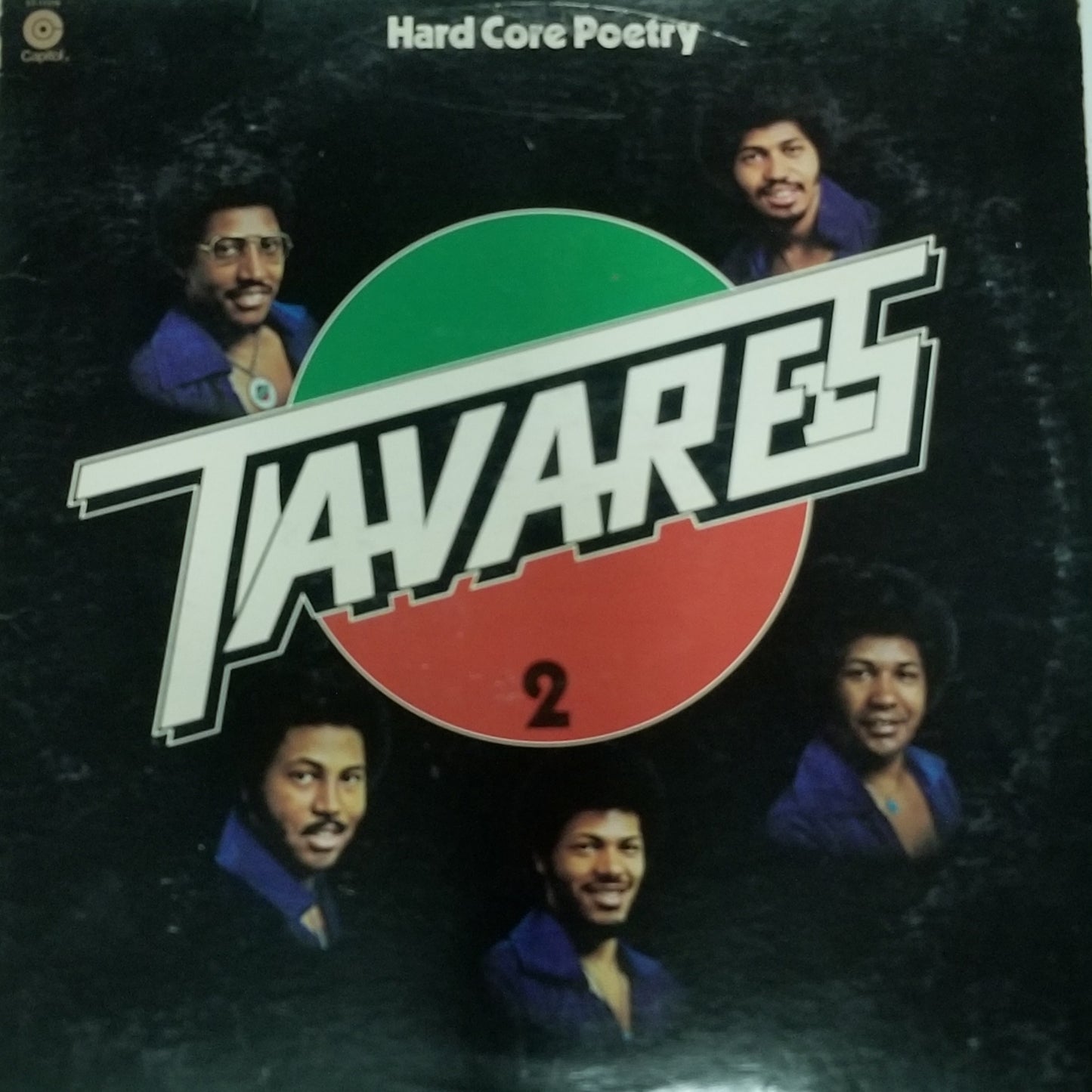 Album cover for 'Navares 2' with four individuals and a green and red circle on a dark background.